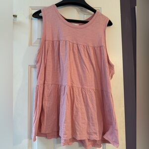 Sleeveless pink ruffled shirt